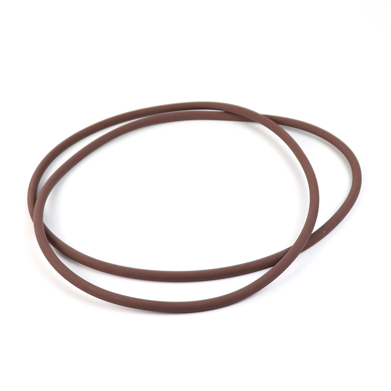 হাতে বাদামী ও-রিং